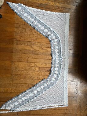 Set of curtain swags with Blue Trim.